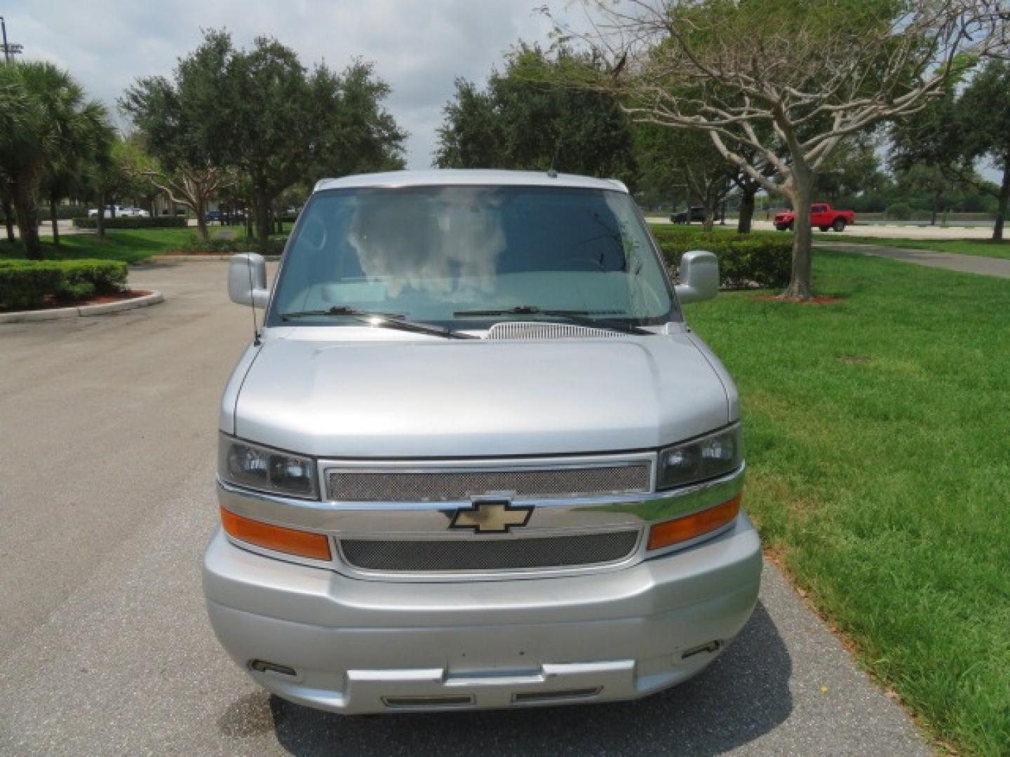 2014 Chevrolet Express (1GBWGLCG3E1) , located at 4301 Oak Circle #19, Boca Raton, FL, 33431, (954) 561-2499, 26.388861, -80.084038 - You are looking at a Rare 2014 Chevy Express 2500 Quigley 4x4 Four Wheel Drive Explorer Limited SE 9 Passenger Conversion Van with: 107K Original Miles, 6 Captain Chairs, Rear Power Folding Bench Seat Bed, Center Consoler Cooler, Front PPF (Paint Protection Film) Explorer Limited Conversion Througho - Photo#22